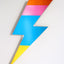 Blue and pink acrylic lightning bolt wall mirror by Bride & Wolfe